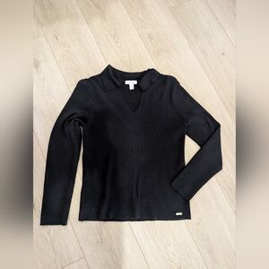 Calvin Klein black ribbed-knit polo sweater with a V-neck and collar